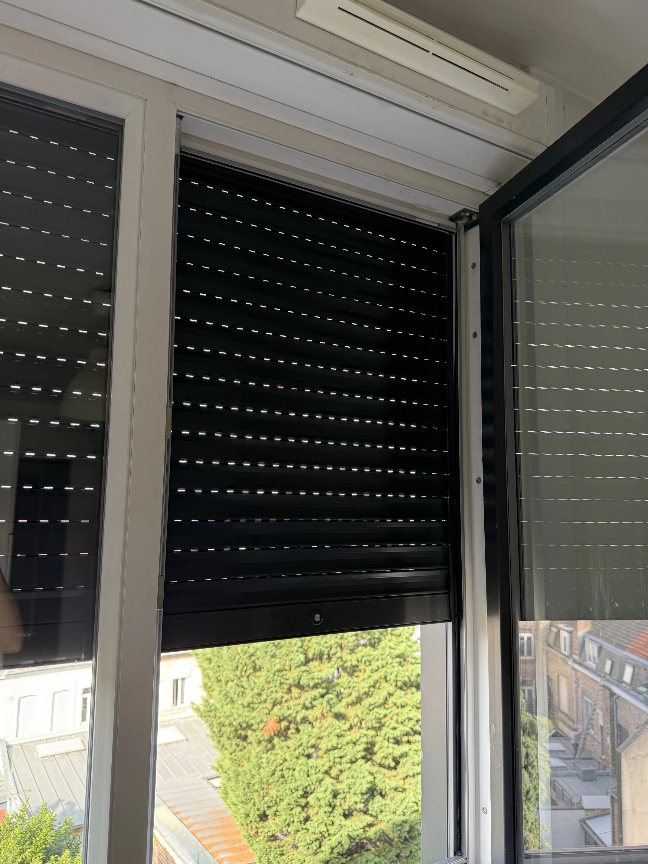 Remplacement du tablier d'un volet roulant bloqué à Lille